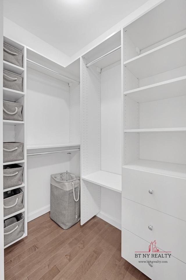 350 W 50th St Unit 6-R, New York City, NY 10019 - walk in closet with wood finished floors