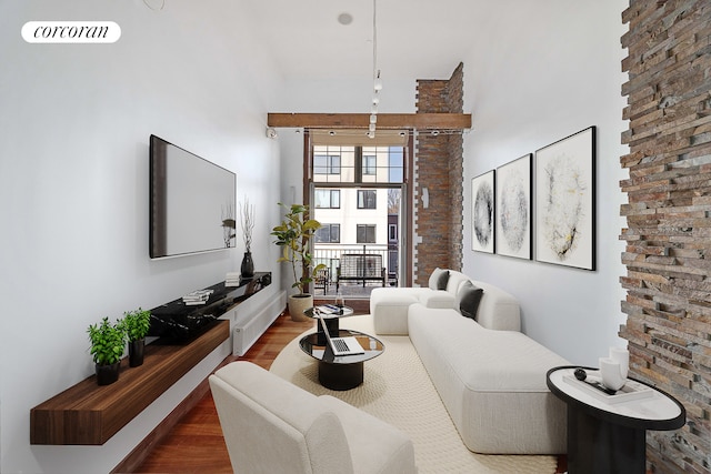 605 Manhattan Ave Unit 4, New York City, NY 11222 - living area featuring wood finished floors and a towering ceiling