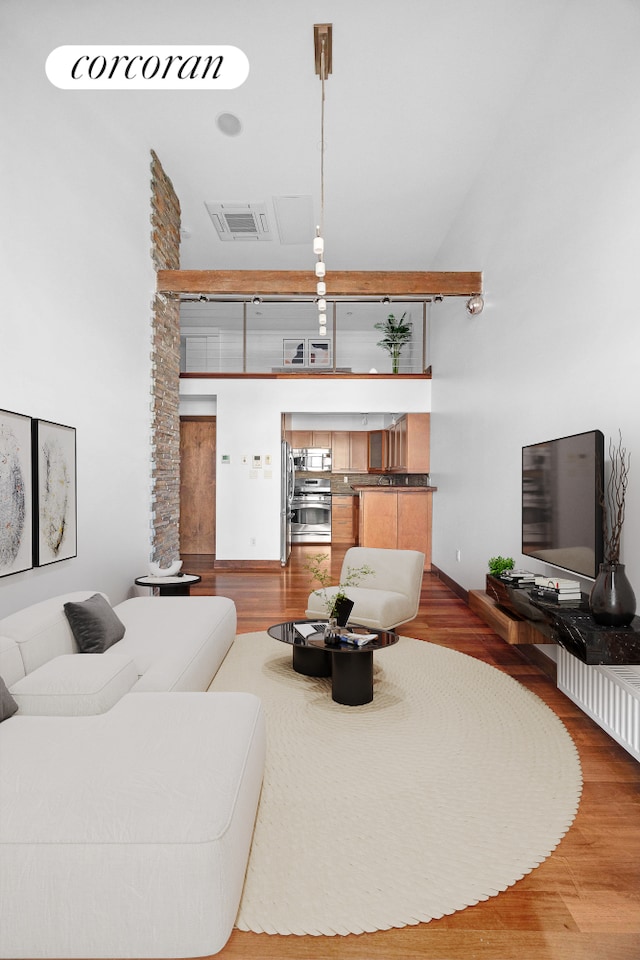 605 Manhattan Ave Unit 4, New York City, NY 11222 - living room featuring wood finished floors