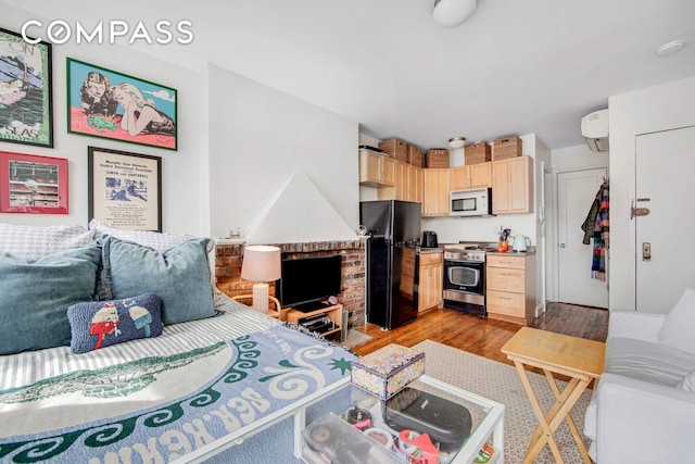 352 W 12th St Unit 5D, New York City, NY 10014 - living area with light wood finished floors