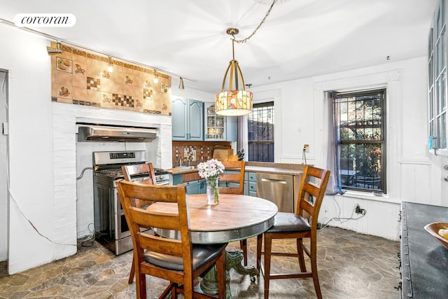 dining area with stone floors