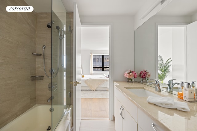 ensuite bathroom with vanity and shower / bathtub combination