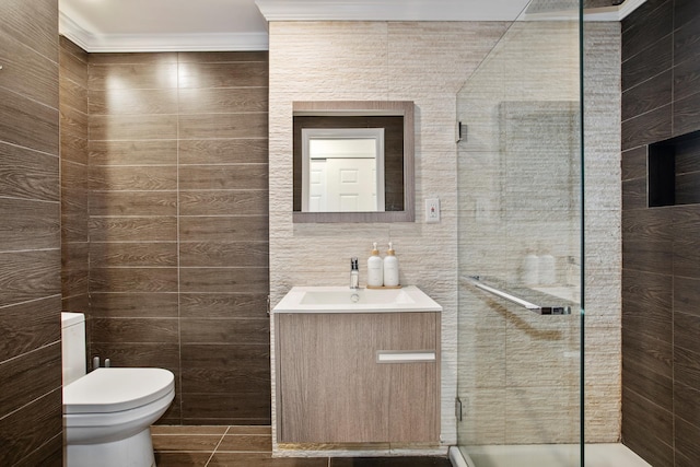 334 E 5th St Unit 3E, New York City, NY 10003 - full bath featuring vanity, toilet, a stall shower, tile patterned floors, and ornamental molding