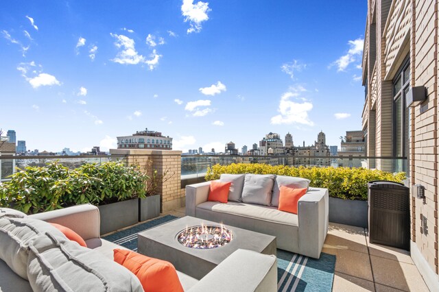 269 W 87th St Phb, Phb, New York City, NY 10024 - view of patio / terrace with an outdoor living space with a fire pit and a city view