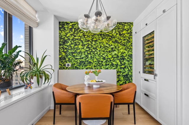 269 W 87th St Phb, Phb, New York City, NY 10024 - dining area featuring light wood finished floors and an inviting chandelier