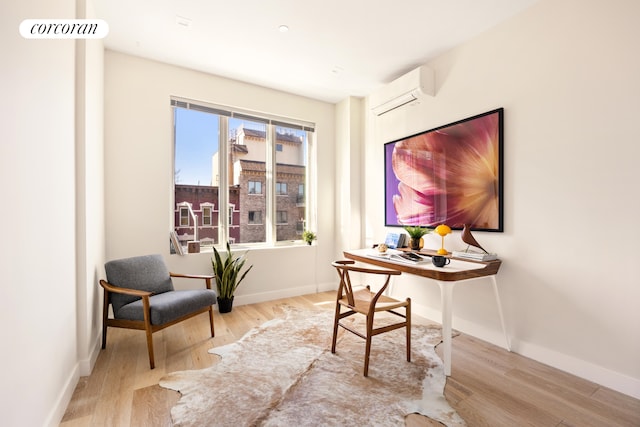 1122 Lafayette Ave Unit 3A, New York City, NY 11221 - home office with wood finished floors, baseboards, and a wall mounted AC