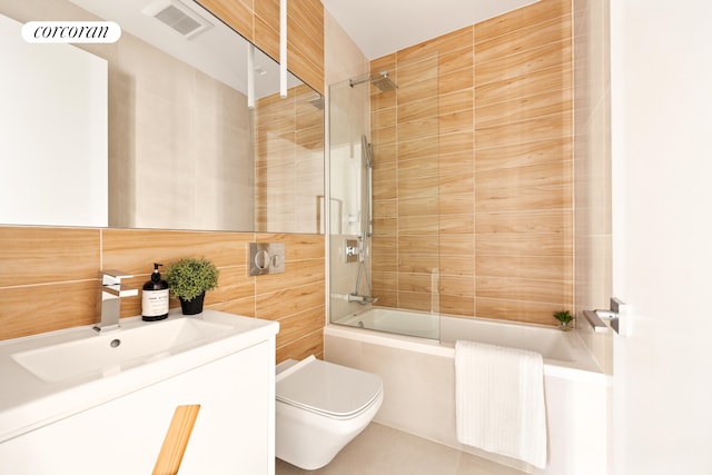 1122 Lafayette Ave Unit 3A, New York City, NY 11221 - bathroom featuring toilet, shower / washtub combination, and vanity