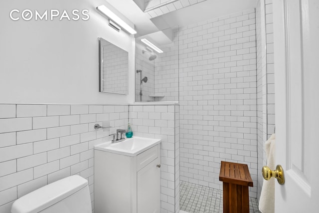 100 Overlook Ter Unit 85, New York City, NY 10040 - full bath featuring tile walls, vanity, and a walk in shower