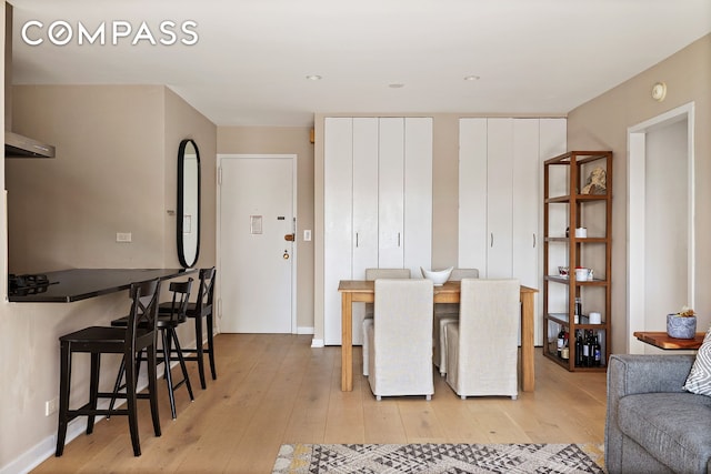 dining room with light wood-style floors