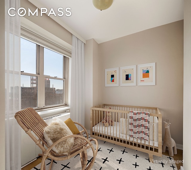 bedroom with a nursery area