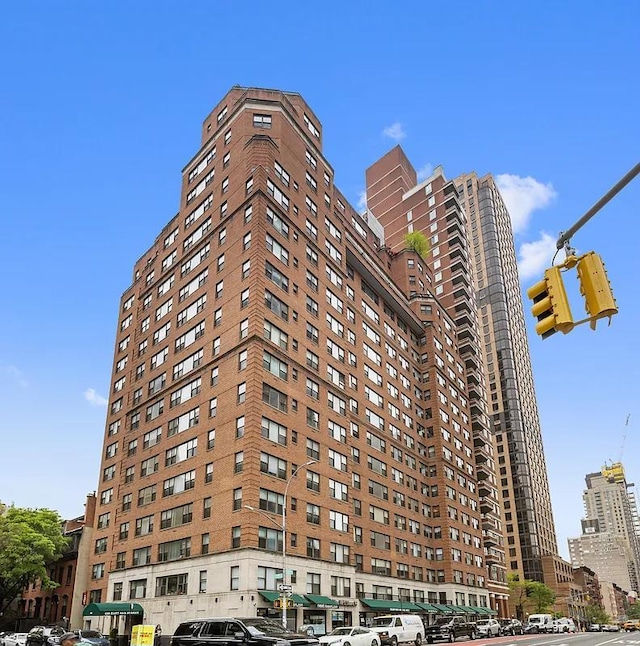view of property with a city view