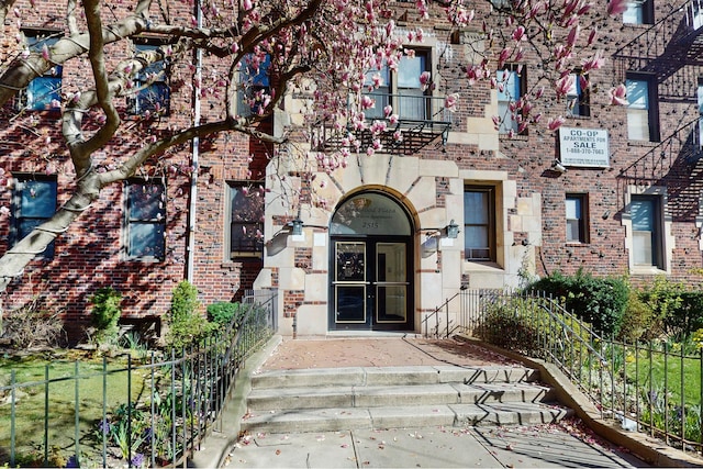 2515 Glenwood Rd Unit 2E, New York City, NY 11210 - view of exterior entry with brick siding and french doors