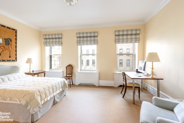 carpeted bedroom featuring crown molding