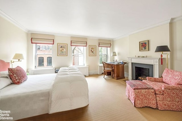 bedroom featuring a fireplace, carpet, and ornamental molding