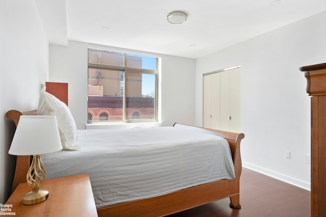 130 Bradhurst Ave Unit 611, New York City, NY 10039 - bedroom featuring wood finished floors and a closet