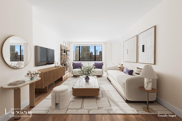 30 W 61st St Unit 24C, New York City, NY 10023 - living area featuring light wood-style flooring and baseboards