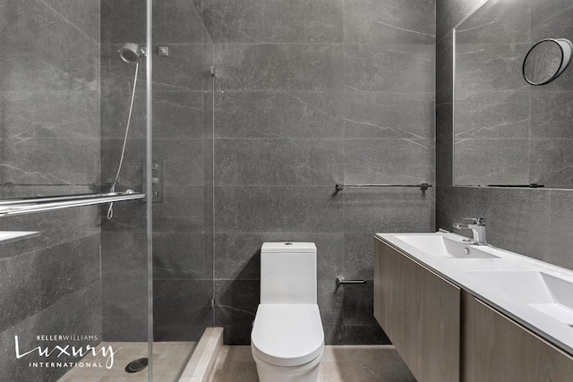 30 W 61st St Unit 24C, New York City, NY 10023 - full bath featuring double vanity, toilet, a shower stall, and a sink
