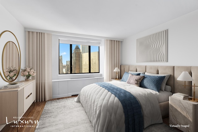 30 W 61st St Unit 24C, New York City, NY 10023 - bedroom with wood finished floors