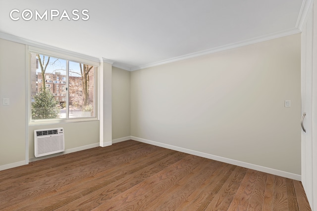 551 Main St Unit 208, New York City, NY 10044 - unfurnished room with crown molding, baseboards, wood finished floors, and a wall unit AC