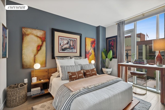 505 W 43rd St Unit 6K, New York City, NY 10036 - bedroom with wood finished floors