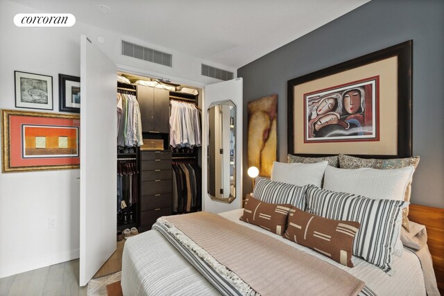 505 W 43rd St Unit 6K, New York City, NY 10036 - bedroom with a closet and baseboards