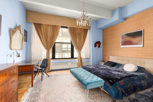 1 Main St Unit 7H, New York City, NY 11201 - bedroom featuring an accent wall, a chandelier, beamed ceiling, radiator, and wood finished floors
