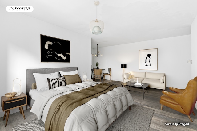 330 E 80th St Unit 3K, New York City, NY 10075 - bedroom featuring wood finished floors and a chandelier