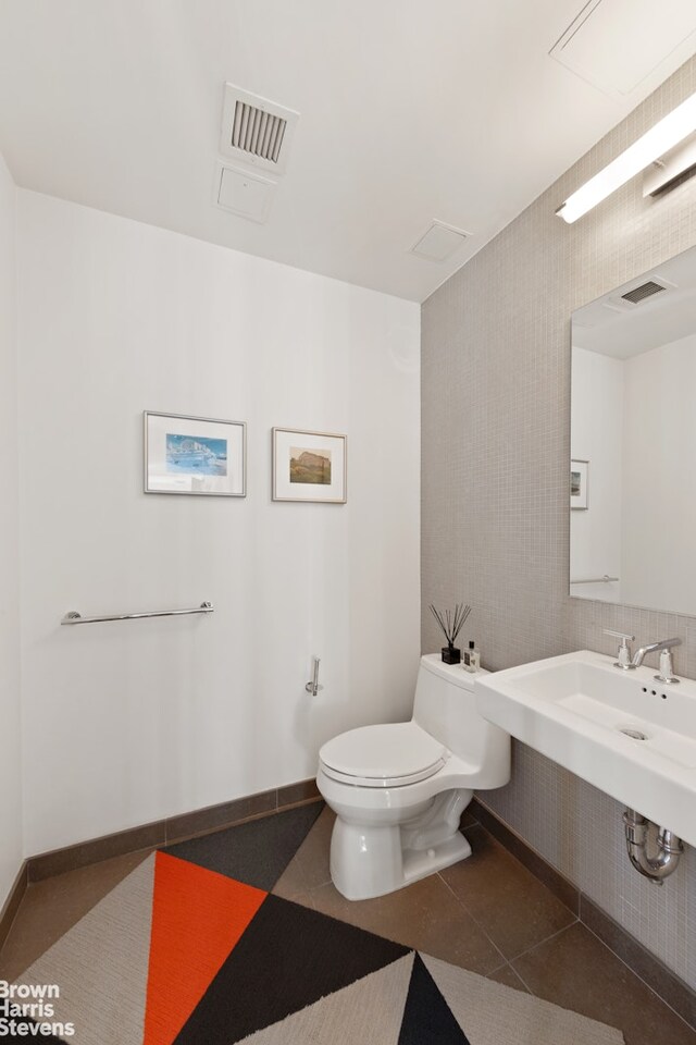 454 W 54th St Unit 7A, New York City, NY 10019 - bathroom featuring toilet