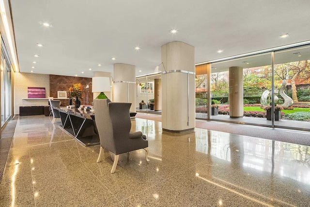 reception area featuring recessed lighting and floor to ceiling windows