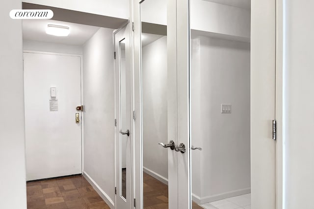 153 E 57th St Unit 11L, New York City, NY 10022 - hall featuring baseboards