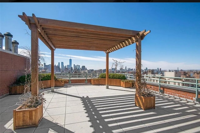 22 W 15th St Unit 8D, New York City, NY 10011 - view of patio / terrace with a view of skyline, a pergola, and fence