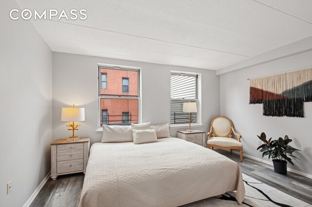 2551 Frederick Douglass Blvd Unit 2551D, New York City, NY 10030 - bedroom featuring wood finished floors and baseboards