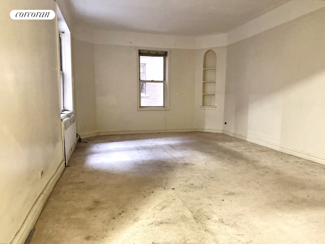 414 Albemarle Rd Unit 1D, New York City, NY 11218 - unfurnished room with built in features, concrete flooring, and baseboards