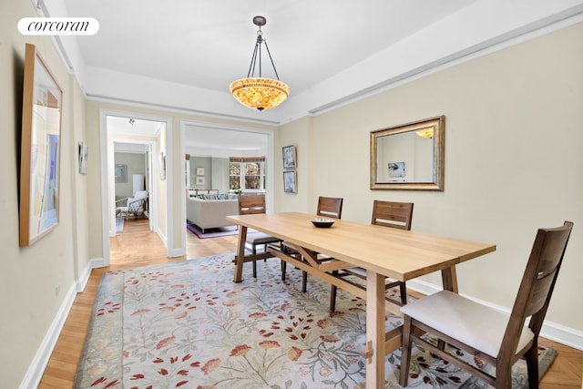 120 Cabrini Blvd Unit 44, New York City, NY 10033 - dining room featuring baseboards and light wood finished floors