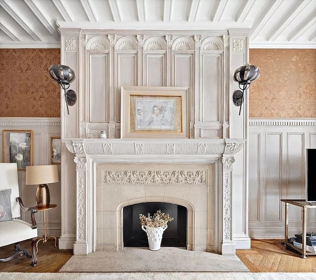390 W End Ave Unit 6A, New York City, NY 10024 - detailed view of wallpapered walls, a fireplace, wainscoting, a decorative wall, and wood finished floors