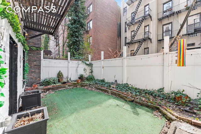 view of yard featuring fence