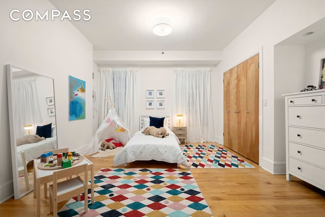 57 Front St Unit 303, New York City, NY 11201 - bedroom with light wood-style floors