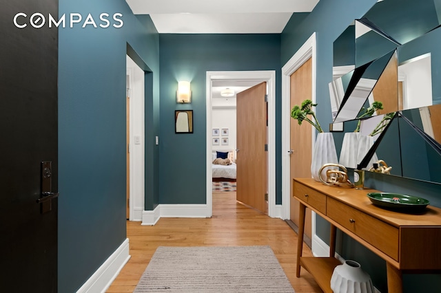 57 Front St Unit 303, New York City, NY 11201 - hallway featuring light wood-type flooring and baseboards