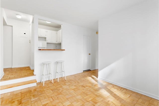 131 W 85th St Unit 1A, New York City, NY 10024 - unfurnished living room with baseboards