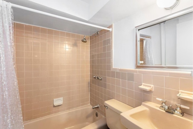 131 W 85th St Unit 1A, New York City, NY 10024 - full bath with a sink, shower / tub combo, toilet, backsplash, and tile walls