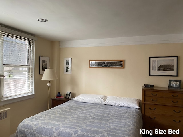 bedroom with radiator heating unit