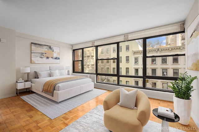 166 E 61st St Unit 4D, New York City, NY 10021 - bedroom with baseboards