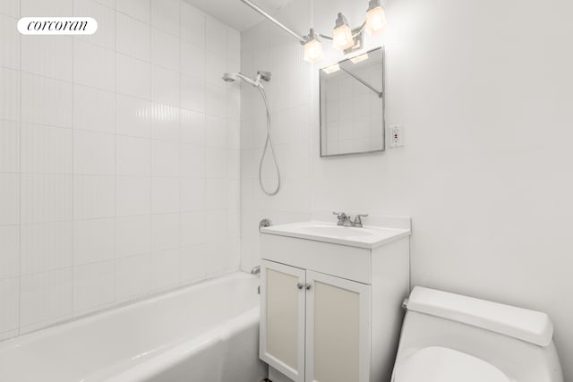 full bath featuring toilet, tub / shower combination, and vanity