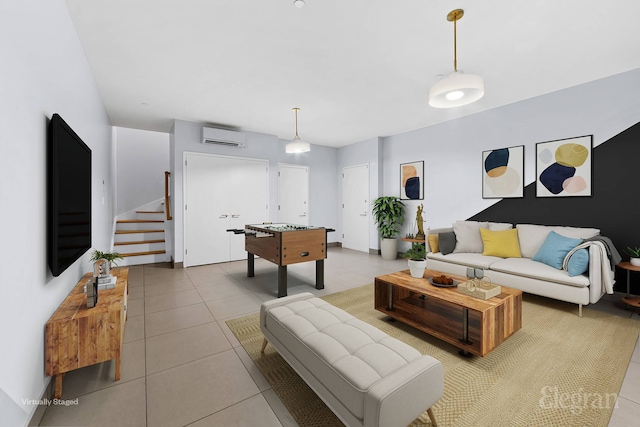 226 15th St Unit 1A, New York City, NY 11215 - living area featuring a wall mounted air conditioner, light tile patterned floors, and stairway