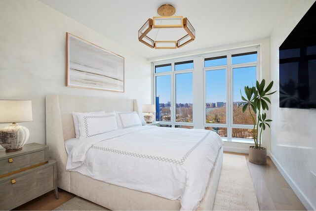 bedroom featuring wood finished floors