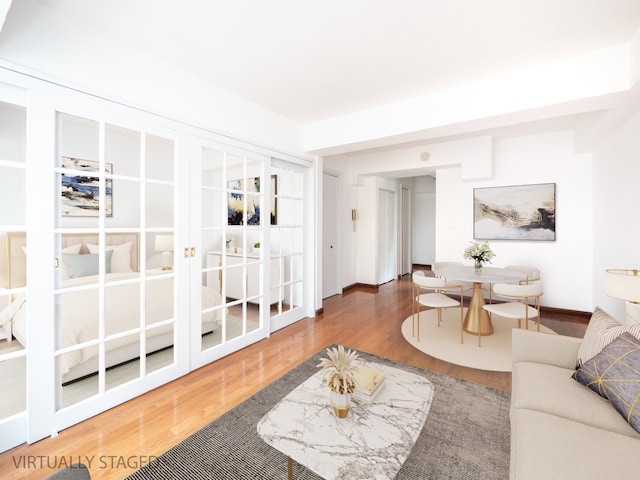 210 E 63rd St Unit 11A, New York City, NY 10065 - living area with wood finished floors and baseboards