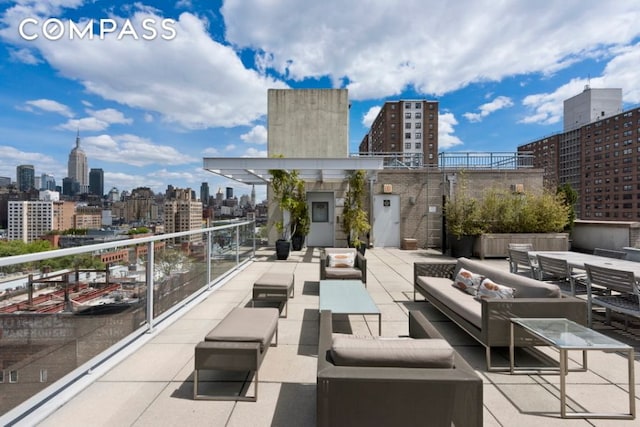444 W 19th St Unit 201, New York City, NY 10011 - view of patio / terrace featuring a skyline view and an outdoor hangout area