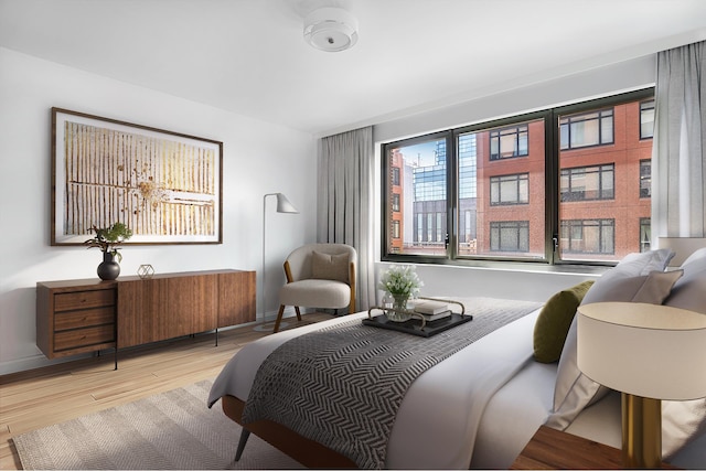 210 W 77th St Unit 7E, New York City, NY 10024 - bedroom featuring wood finished floors and baseboards