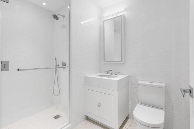 210 W 77th St Unit 7E, New York City, NY 10024 - full bathroom with tile walls, a shower stall, and vanity