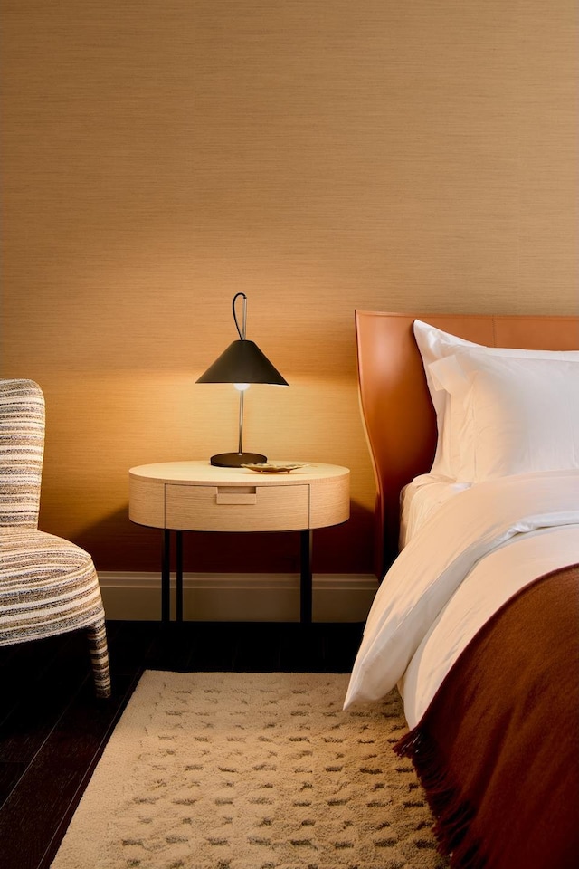 bedroom featuring baseboards